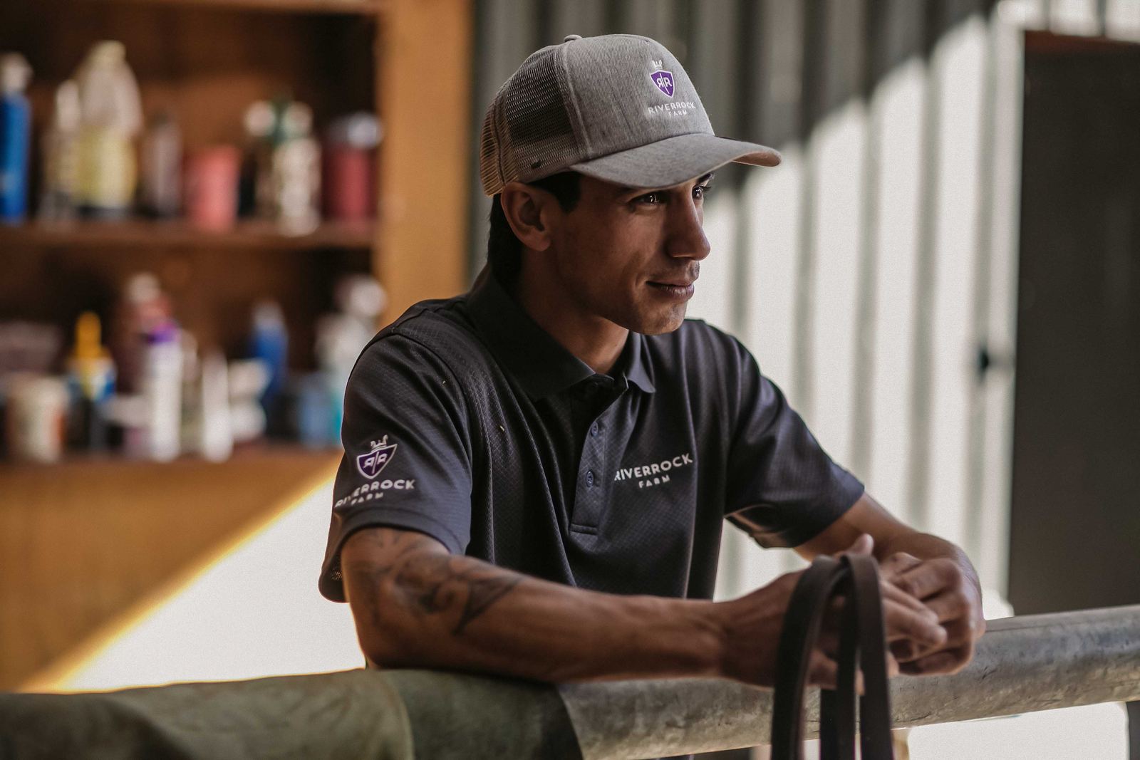 Chad Ormsby in the stables at Riverrock Farm