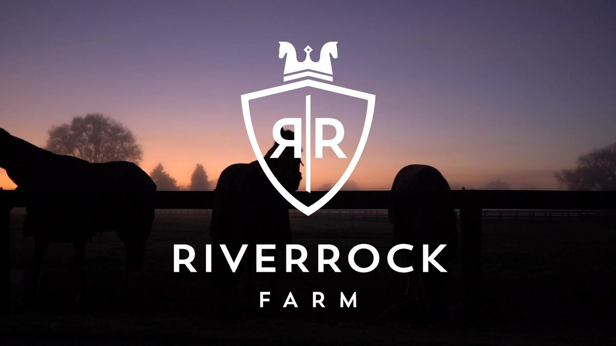 Riverrock Farm shield at sunset
